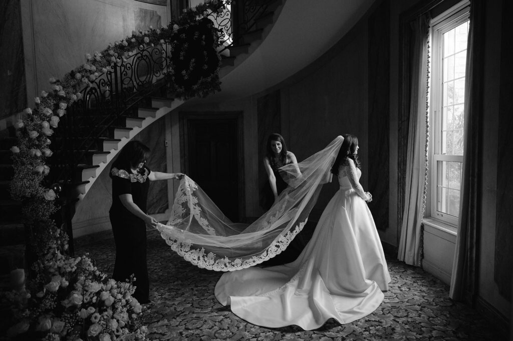 Editorial bridal portrait with a long veil  at Pine Hollow Country Club. 