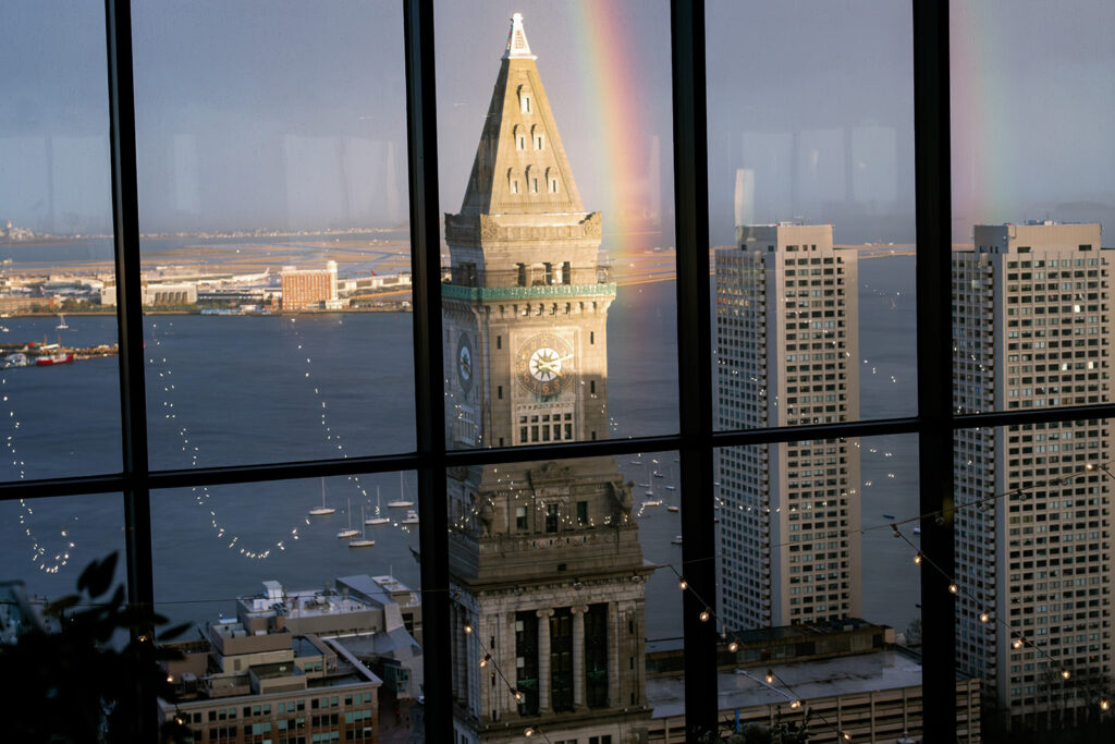 Miraculous rainbow over the Custom House Tower during a Boston State Room wedding ceremony. 