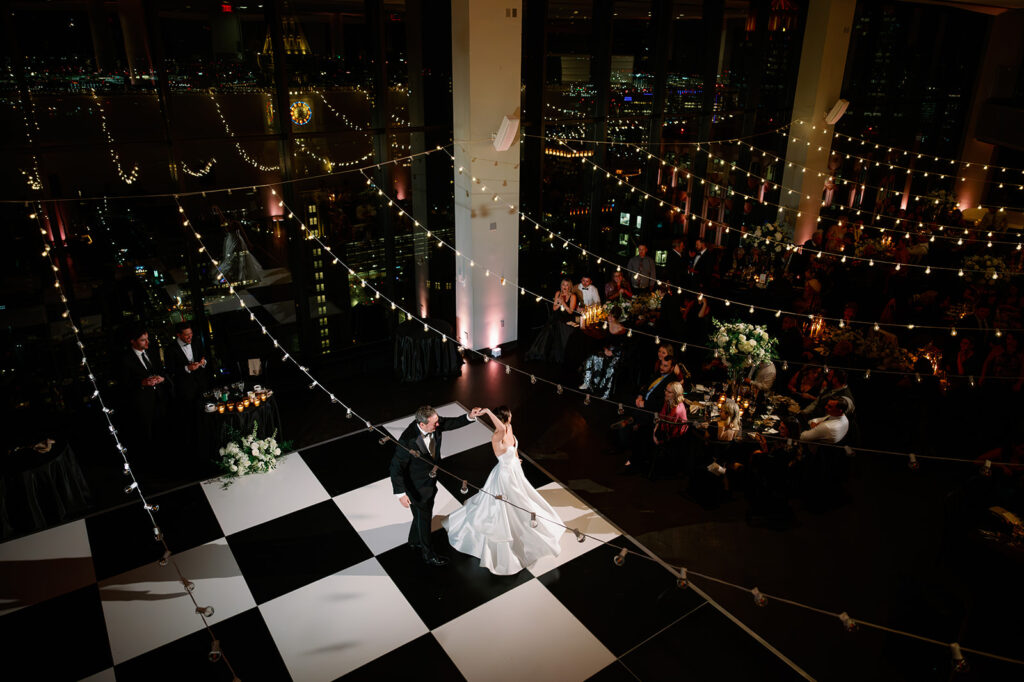 Boston State Room wedding father-daughter first dance on a checkered dance floor birds-eye view. 