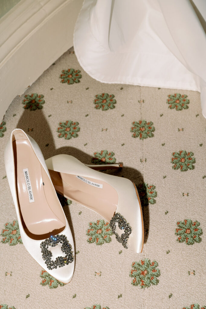 Manolo Blahniks white satin jewel buckle pump bridal shoe.