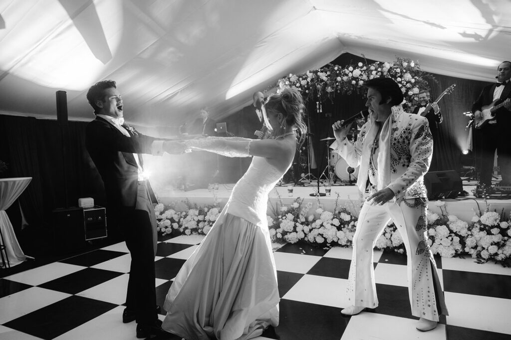 Surprise Elvis impersonator at a luxury destination wedding reception in Ireland.
