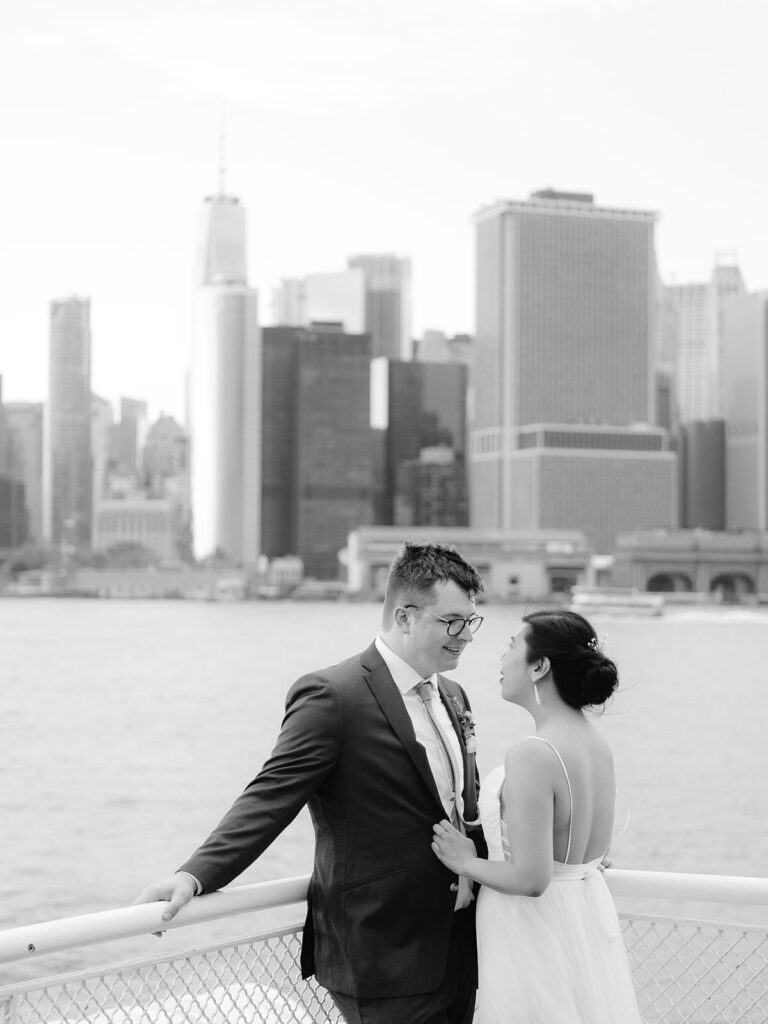 Couple sharing an intimate moment on a ferry in New York City. 