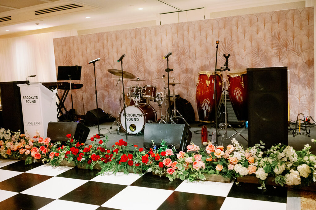 Wedding reception checkered dance floor and "Brooklyn Sound" band setup at the Ocean House ballroom. 