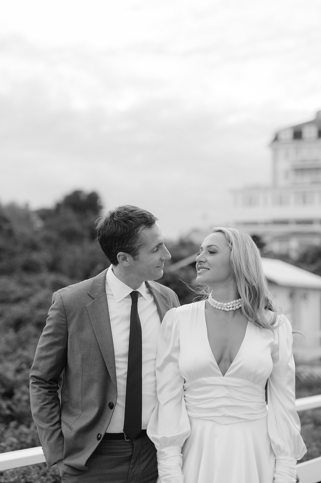 Black and white, editorial portrait of a bride and groom during their rehearsal dinner in Rhode Island. 