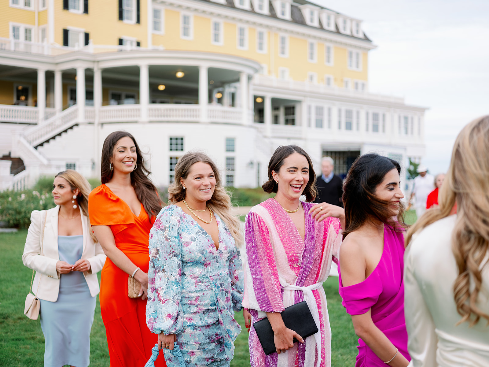 Bridesmaids lined up during a ceremony rehearsal outside Ocean House in Rhode Island.