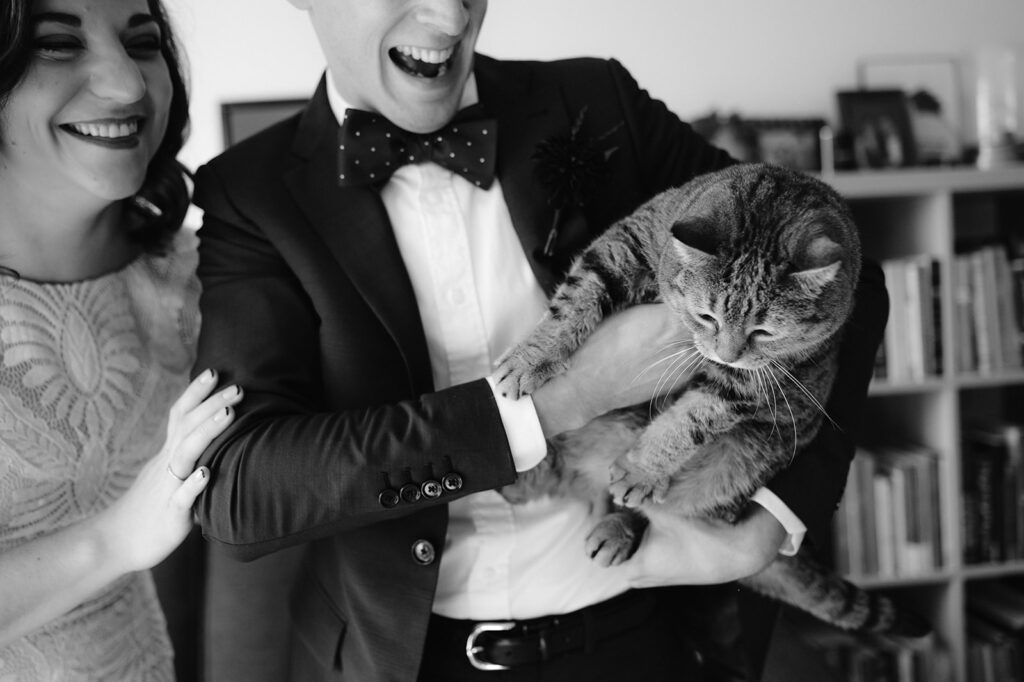 Katherine Marchand Photography Tips to Include Your Pet in your Wedding Bride and Groom with their Cat