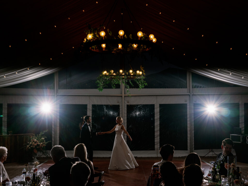 Bride and groom first dance at their tented wedding reception in Sun Valley, Idaho.