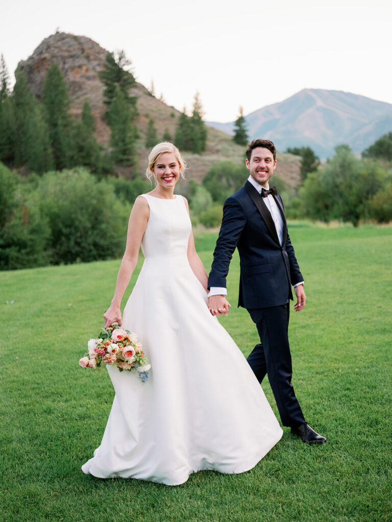 Bride and groom portraits against a lush green backdrop in Sun Valley, Idaho.
