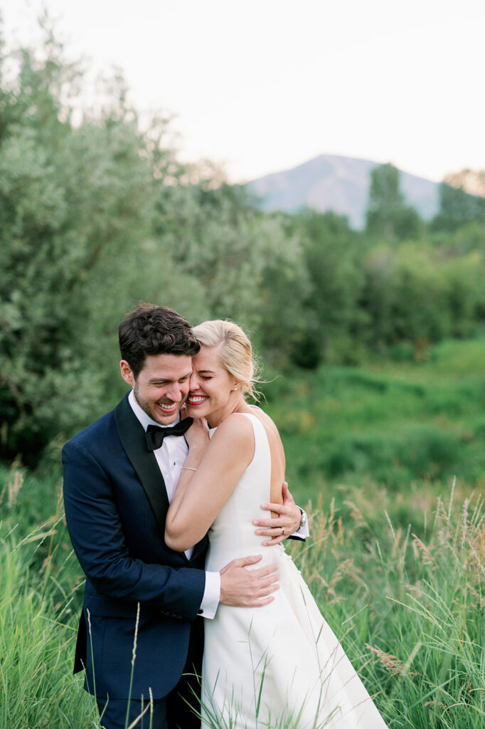 Candid portrait of the bride and groom in Sun Valley, Idaho.