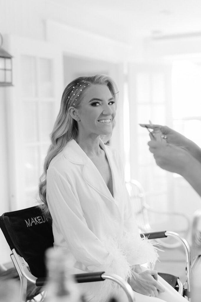 Bride getting her makeup done.