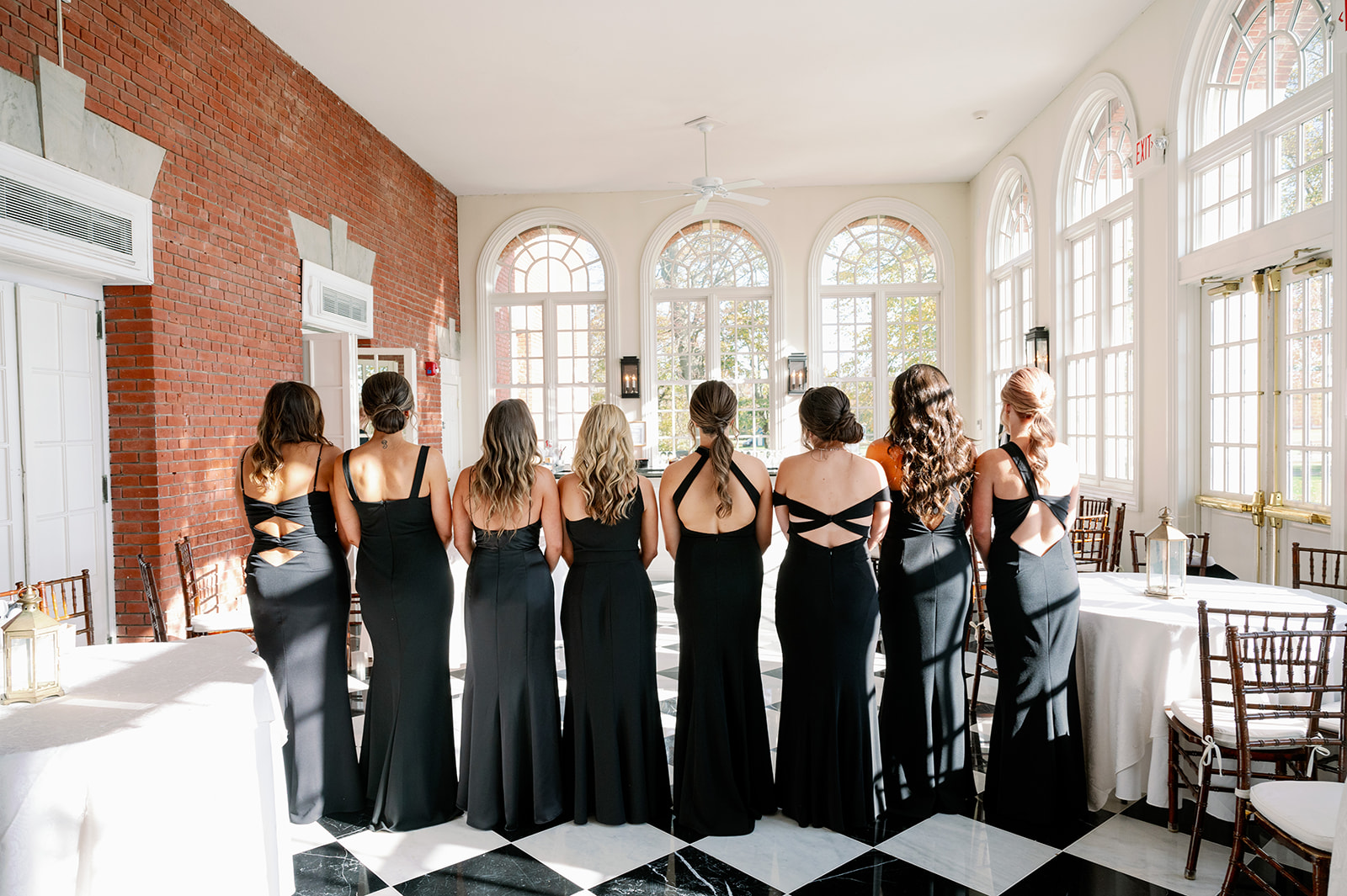 Bridesmaid first look at the Bourne Mansion with checkered floor.