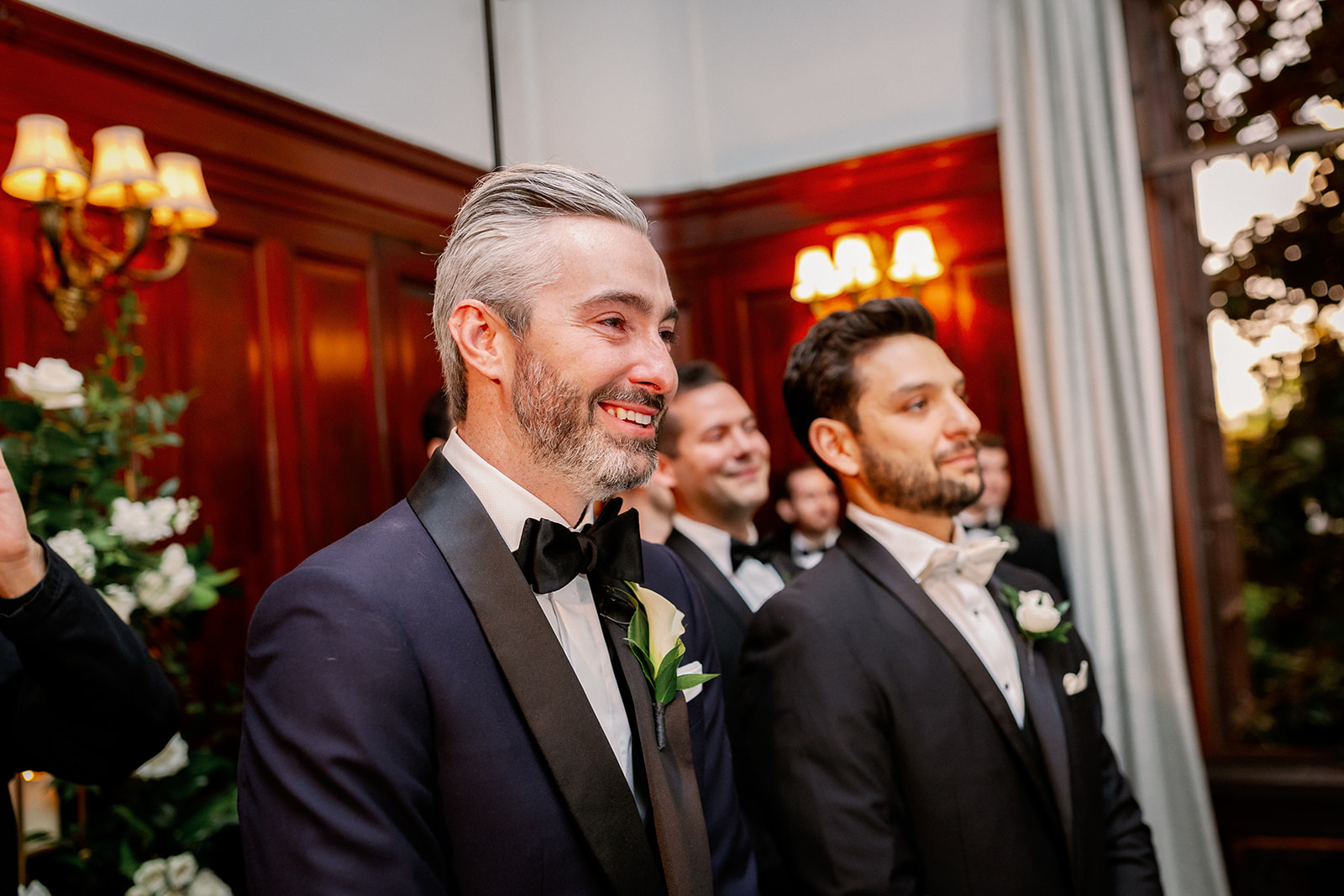 Groom's first look reaction seeing his bride walk down the aisle.