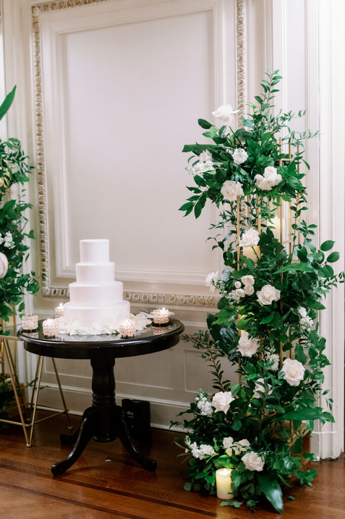 4-tier simple white wedding cake.
