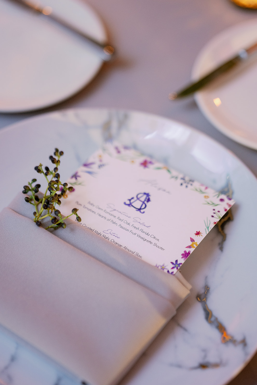 Wedding table place setting and menu.