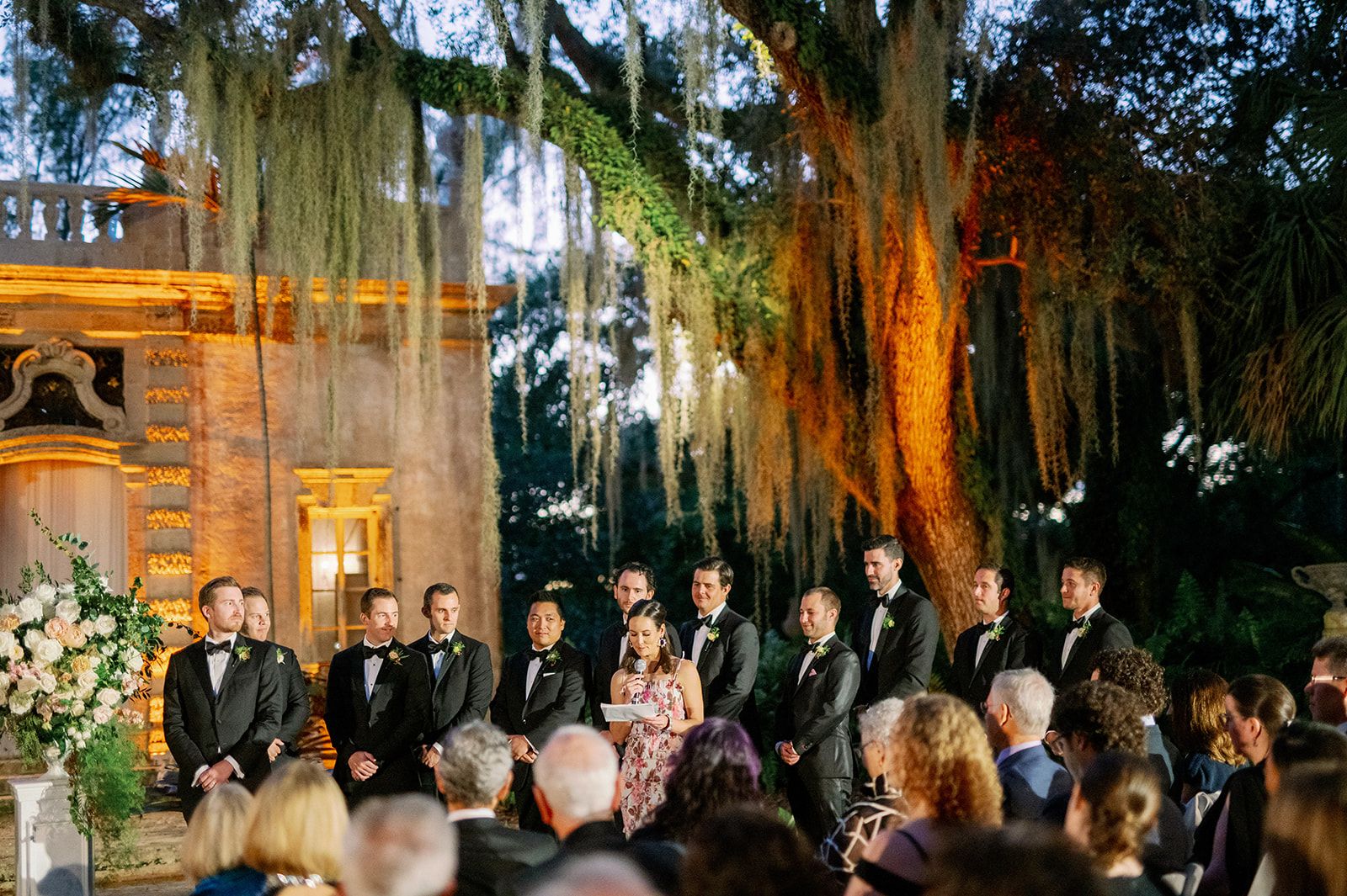 Nighttime wedding ceremony at Vizcaya Museum and Gardens.