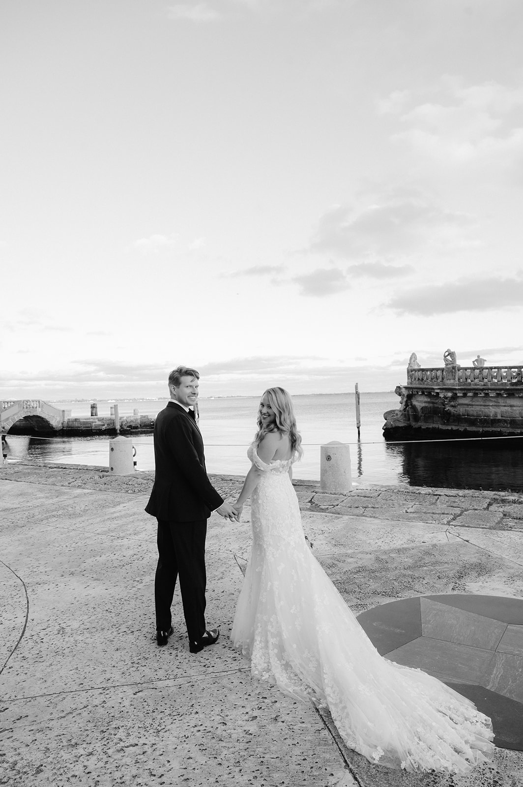Bride and groom portrait at the Dock at Vizcaya Museum and Gardens.