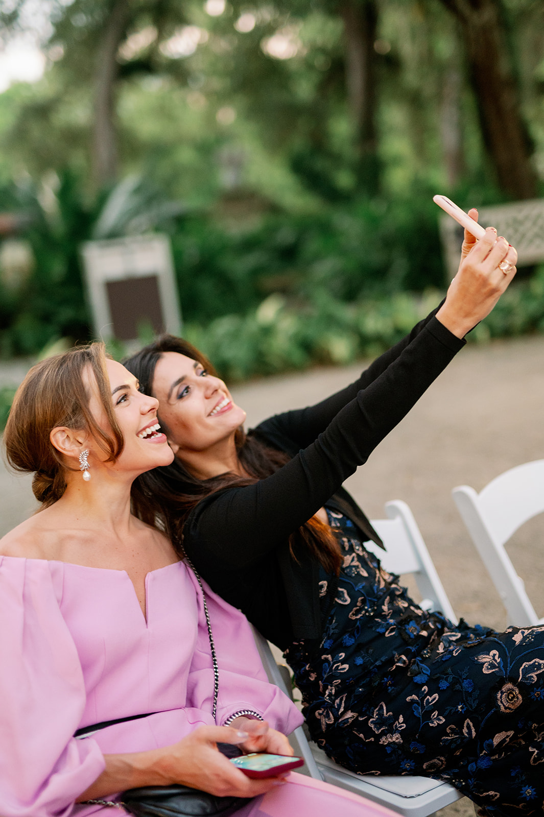 Wedding guests taking a selfie.