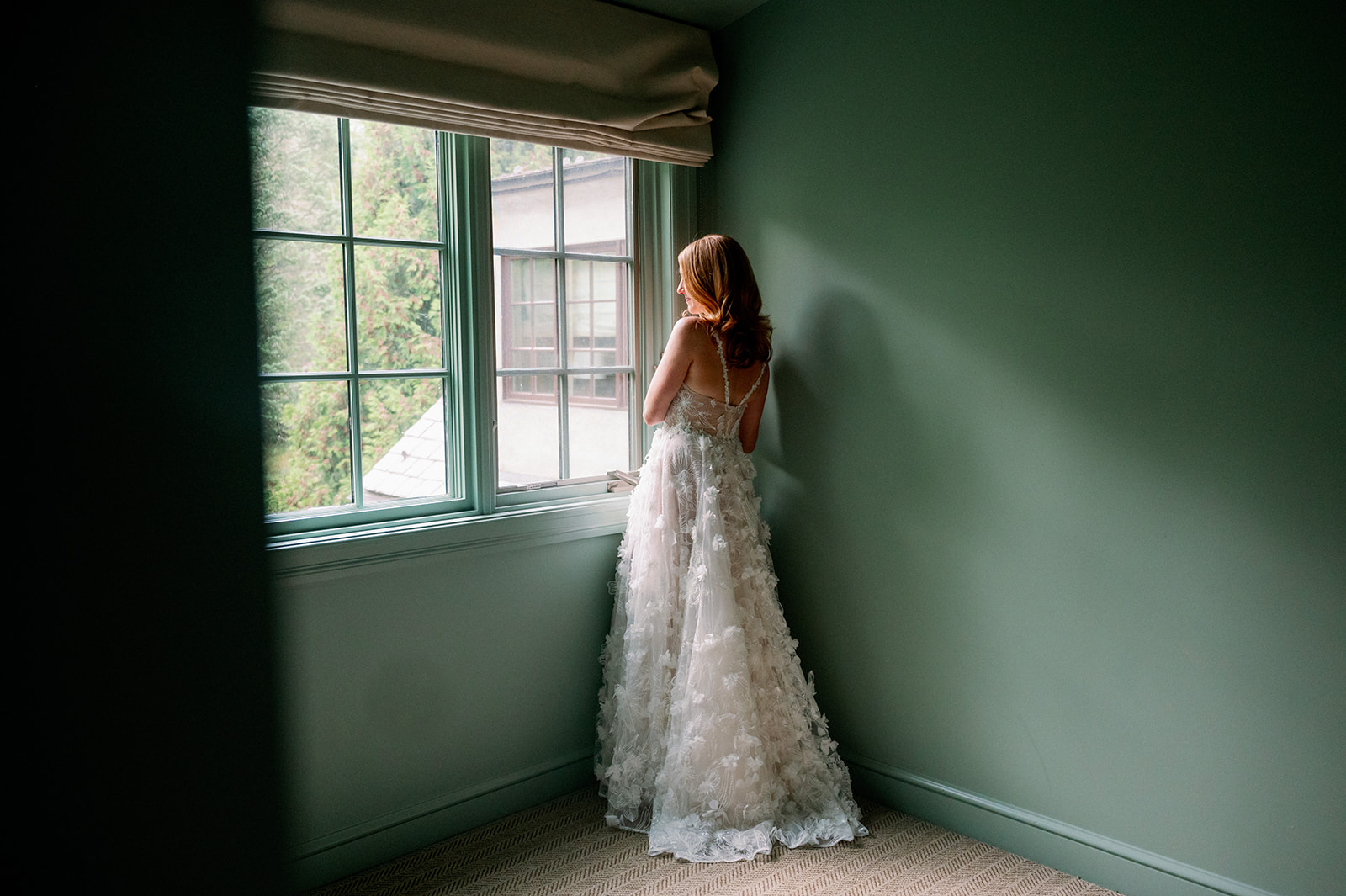Romantic bridal portrait in front of a window in the Manor House at Troutbeck in Amenia, NY.
