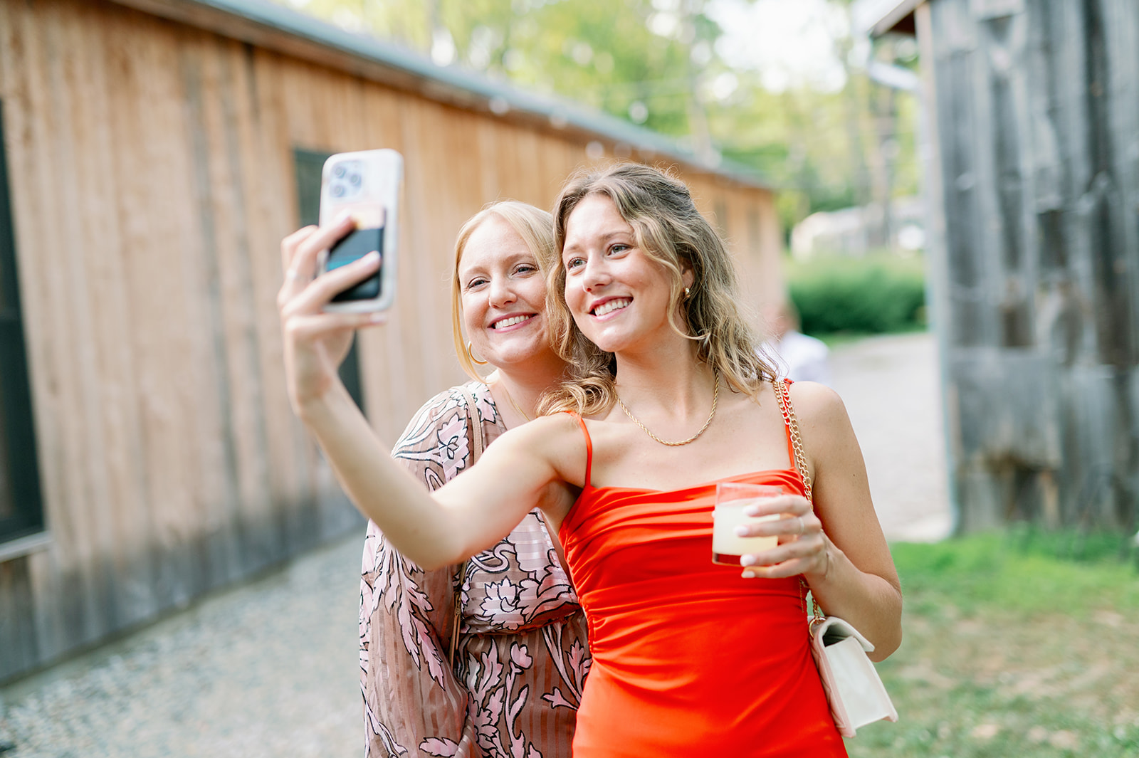 Wedding guests taking a selfie.