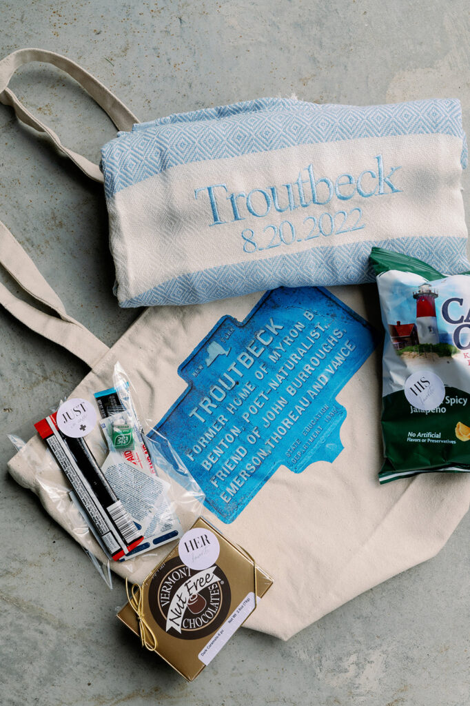 Custom wedding welcome bags with the Troutbeck logo and treats. 