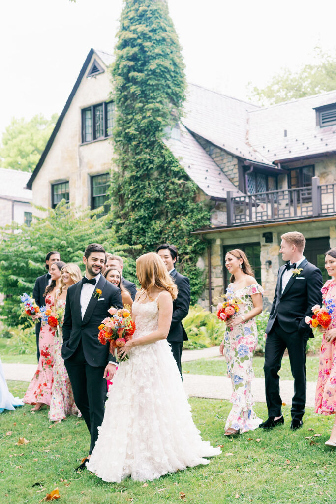 Colorful summer wedding with floral bridesmaid dresses at Troutbeck.