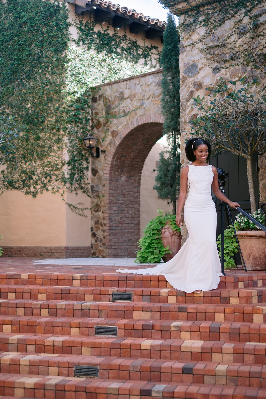 Bride descending down the steps of Bella Collina for the first look.