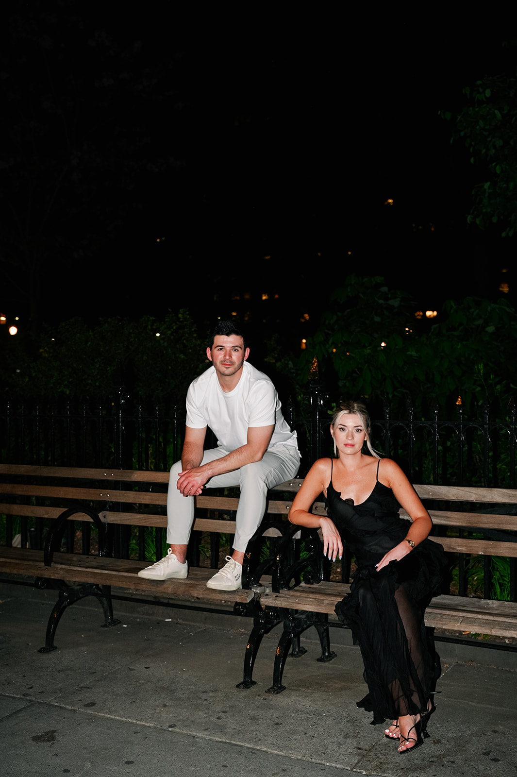 Stylish nighttime engagement session in Madison Square Park.