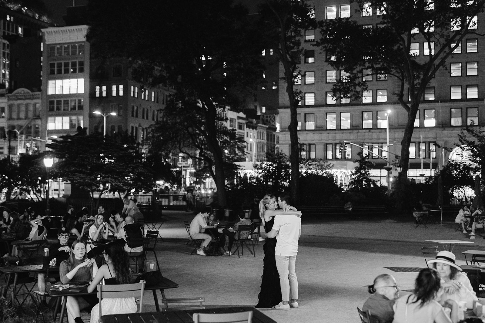 Romantic nighttime engagement session in Madison Square Park.