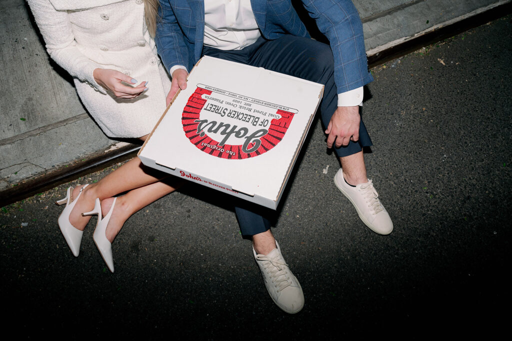 Pizza engagement photos in New York City.