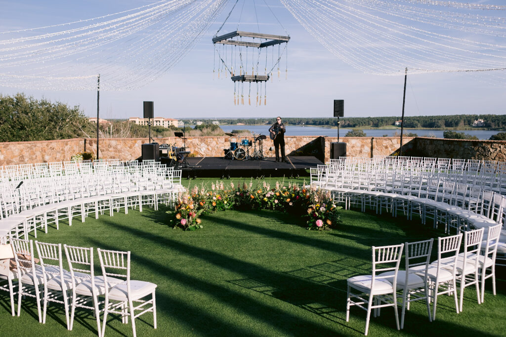 Outdoor wedding ceremony with round seating at Bella Collina in Orlando.