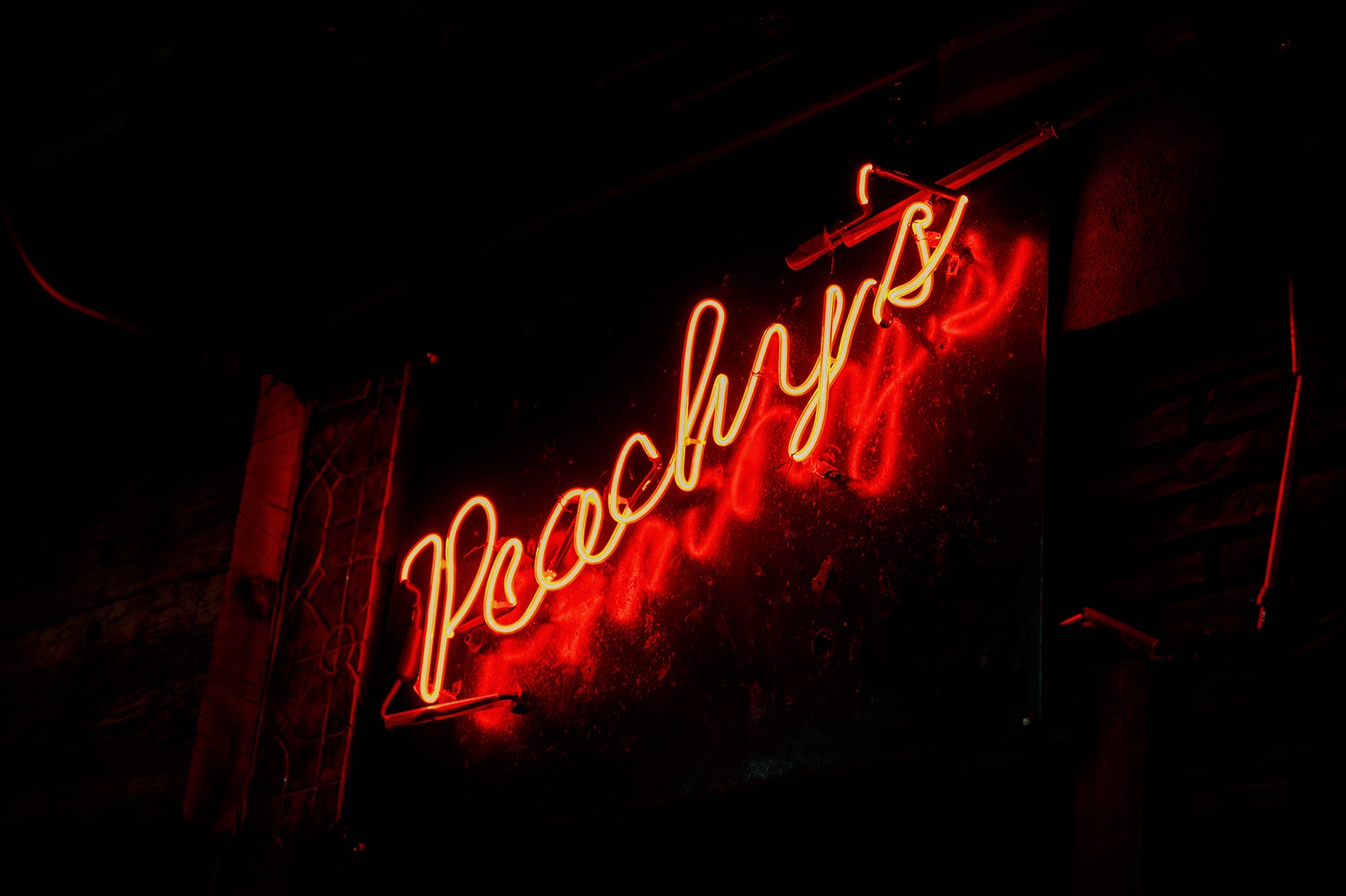 Peachy's neon sign Chinatown, NYC.