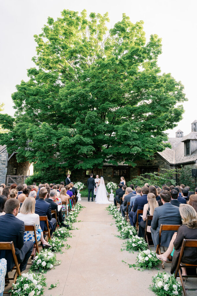 Romantic outdoor ceremony at Blue Hill at Stone Barns in New York. 