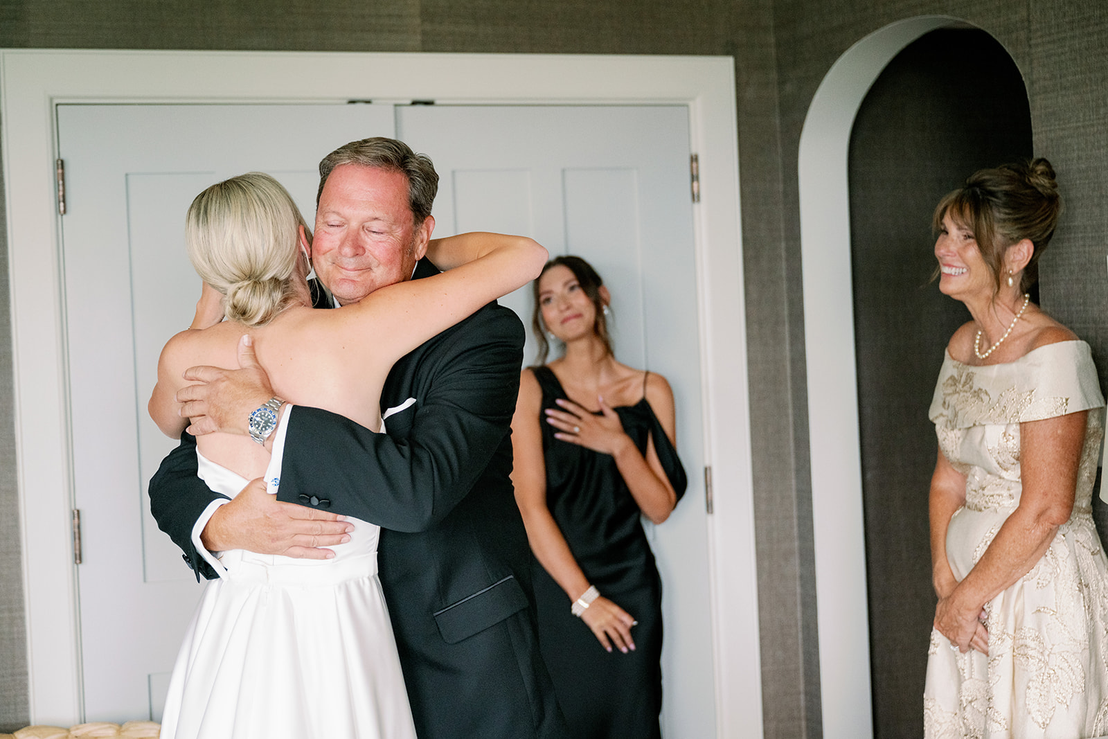 Bride hugging her dad after an emotional first look. 