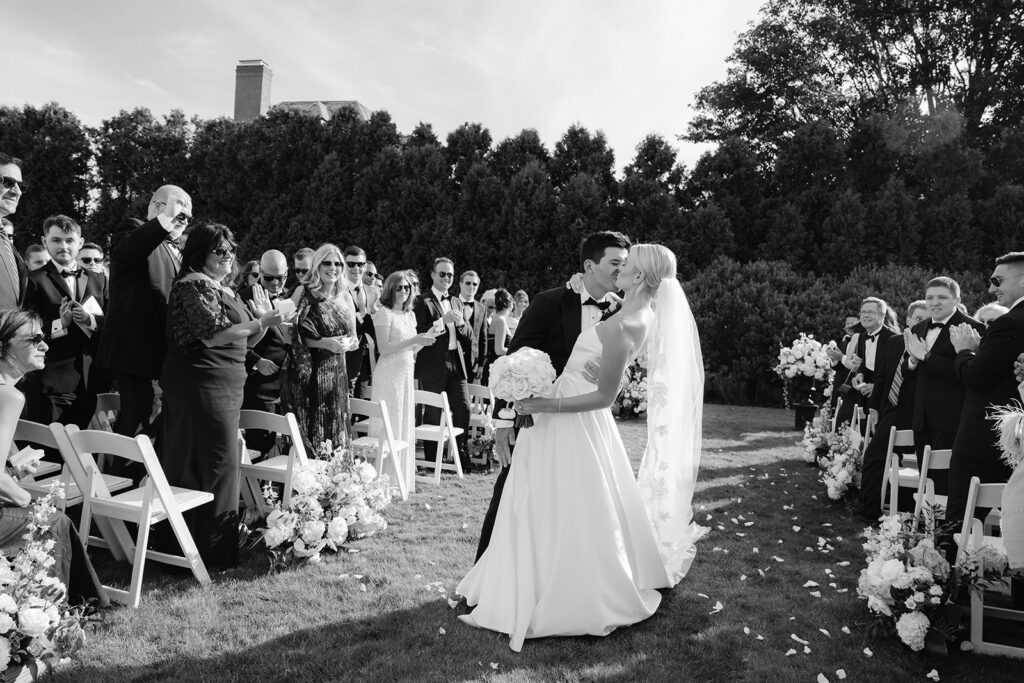 Bride and groom recessional kiss at Ocean House in Rhode Island. 