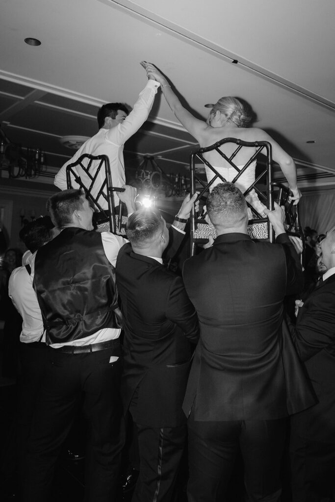 Bride and groom reception chair dance at Ocean House. 