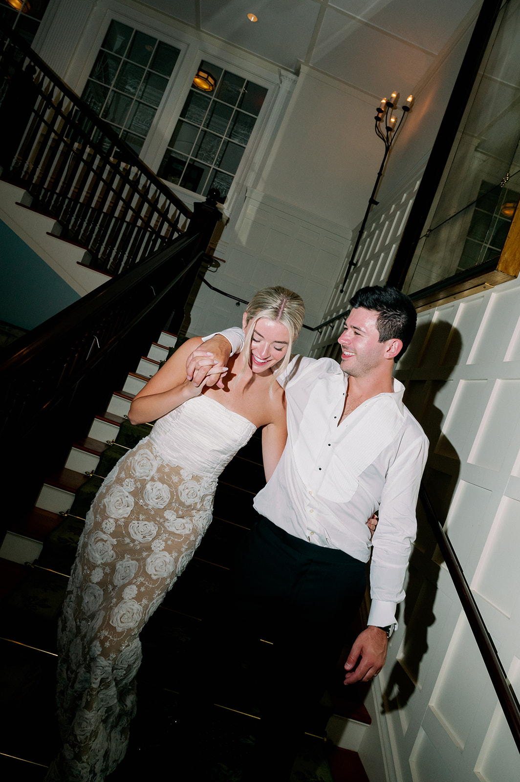 Bride and groom direct flash after party portrait at Ocean House. 