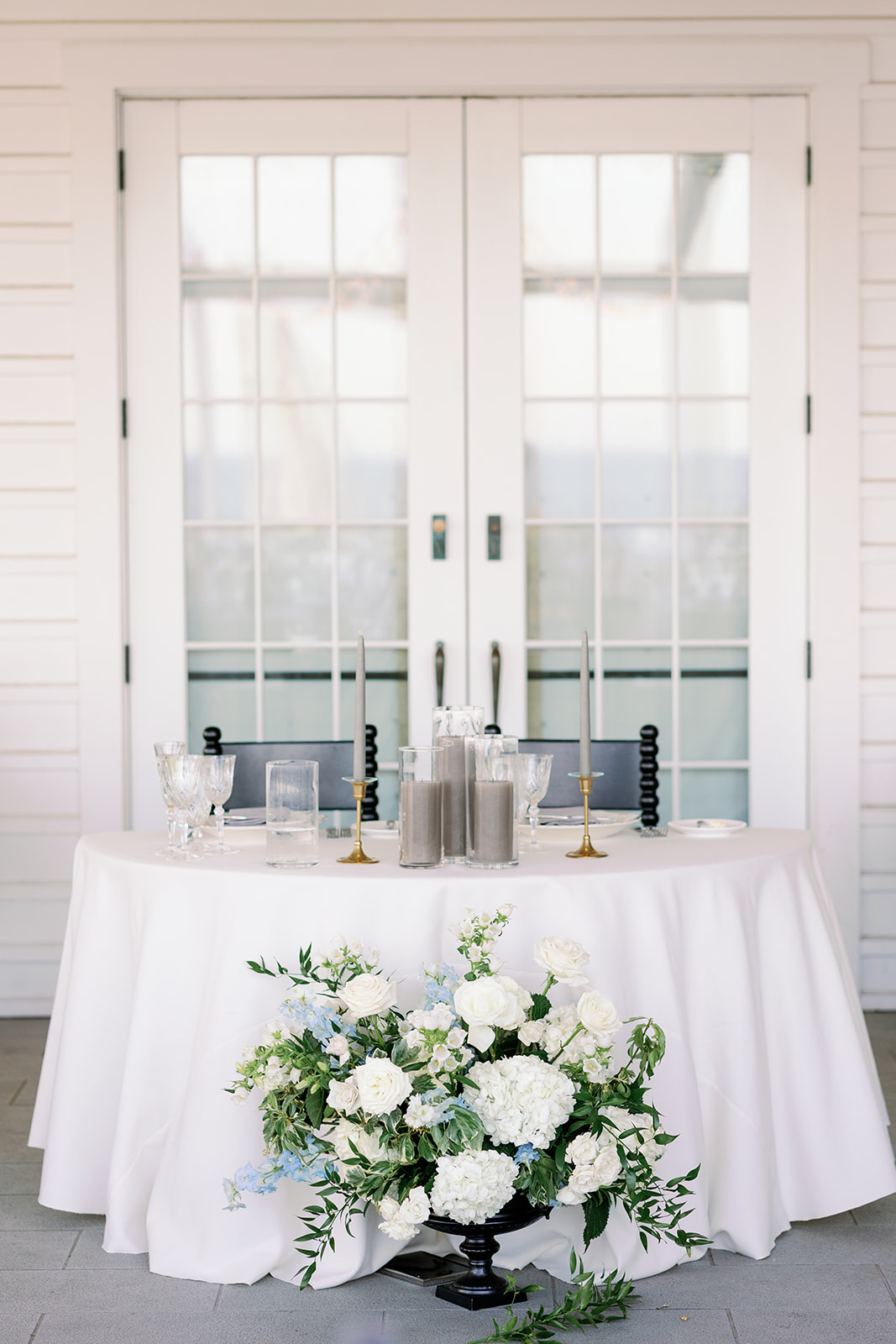 Ocean House outdoor wedding reception sweetheart table. 