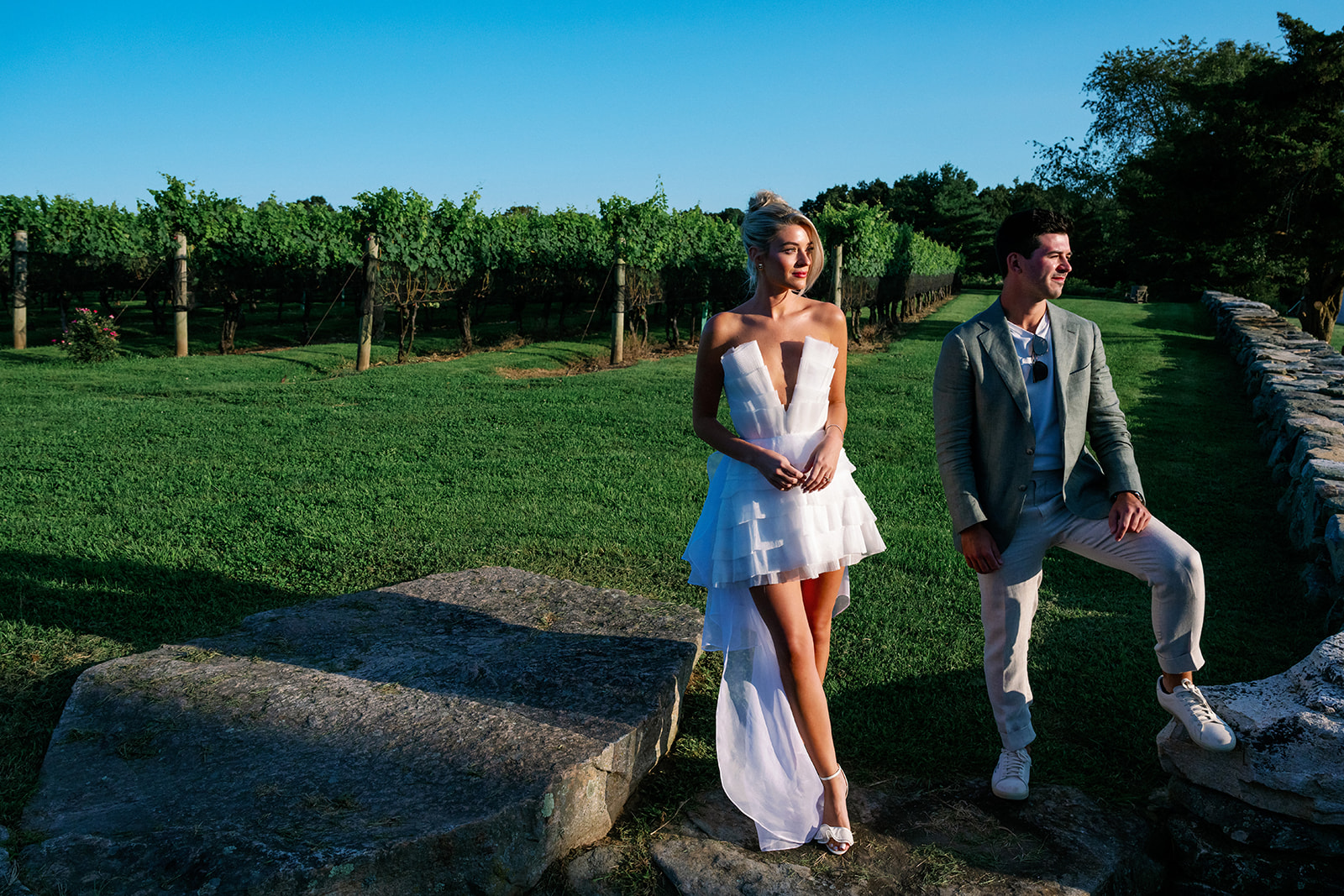 Bride and groom posing at Jonathan Edwards Winery the night before their wedding. 