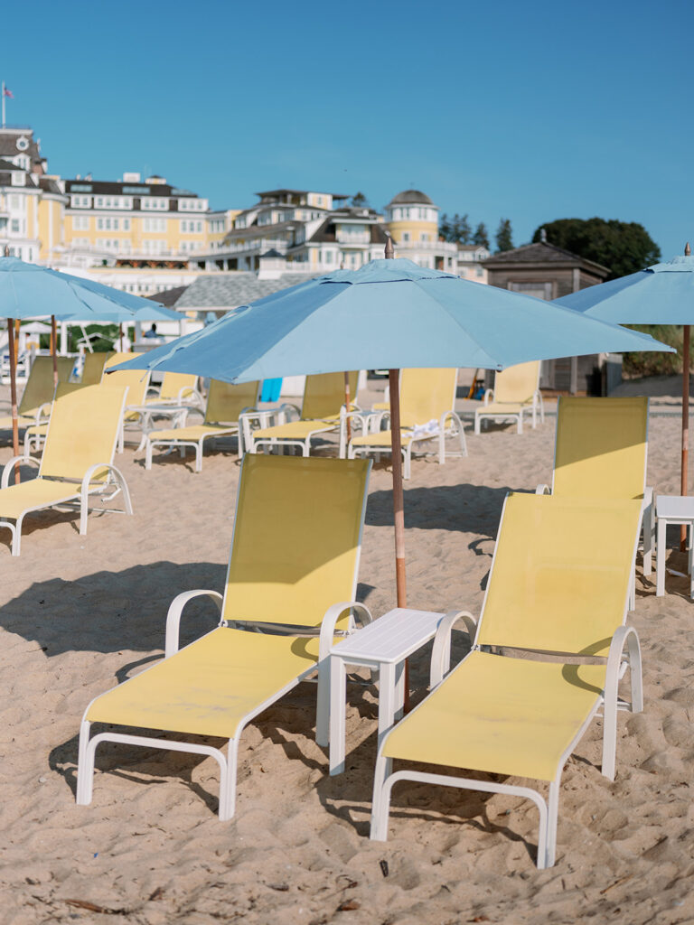 Yellow beach chairs on the beach at Ocean House hotel in Rhode Island.