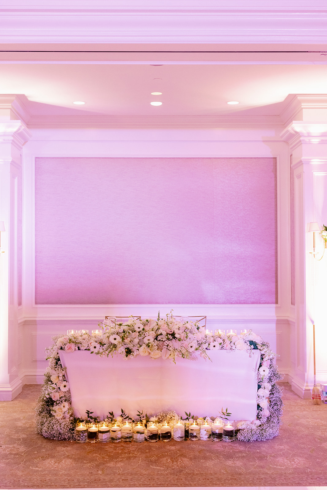 Glam floral wedding reception sweetheart table. at Pine Hollow Country Club.