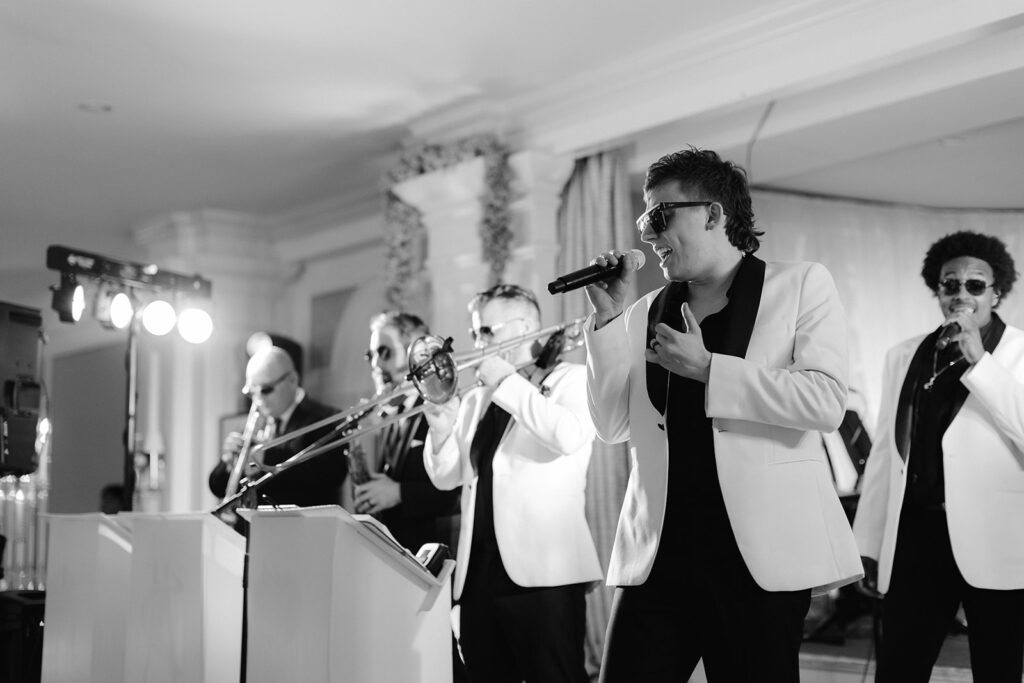 Live band performing at a luxury Pine Hollow Country Club wedding. 