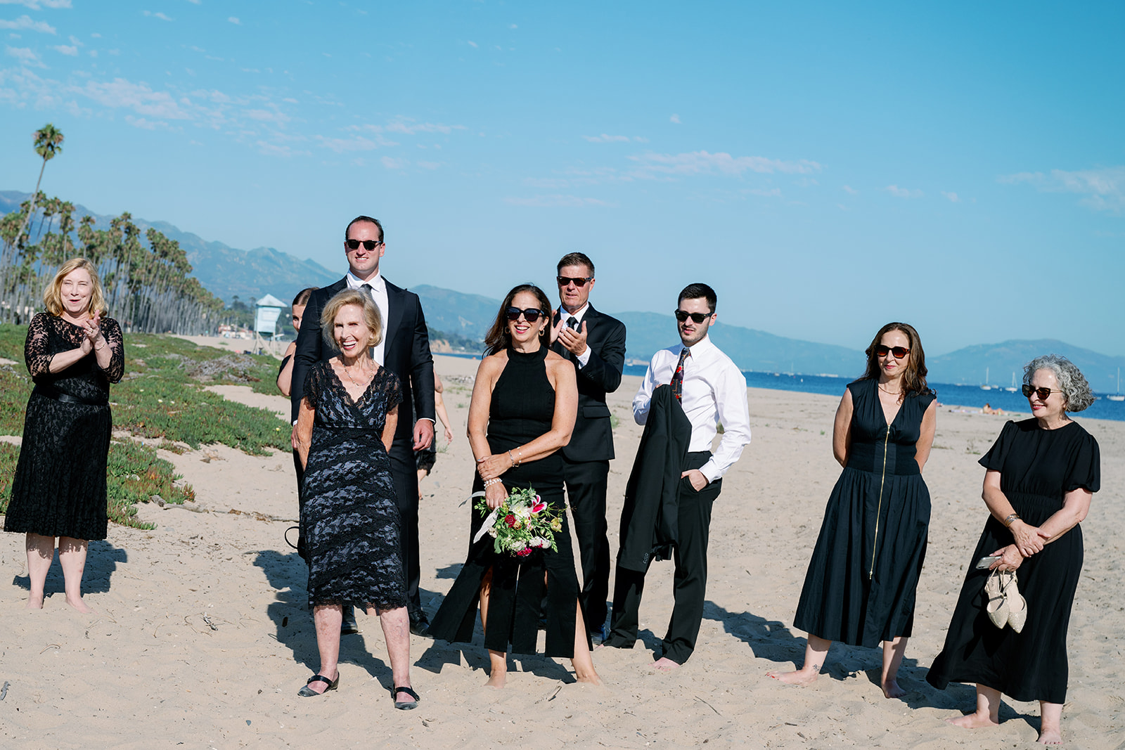 Candid family wedding photos on the beach in Santa Barbara