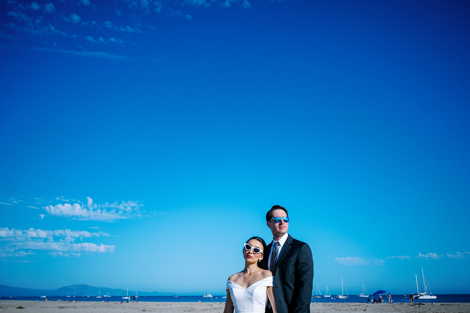 Santa Barbara bride and groom beach photo with sunglasses. 