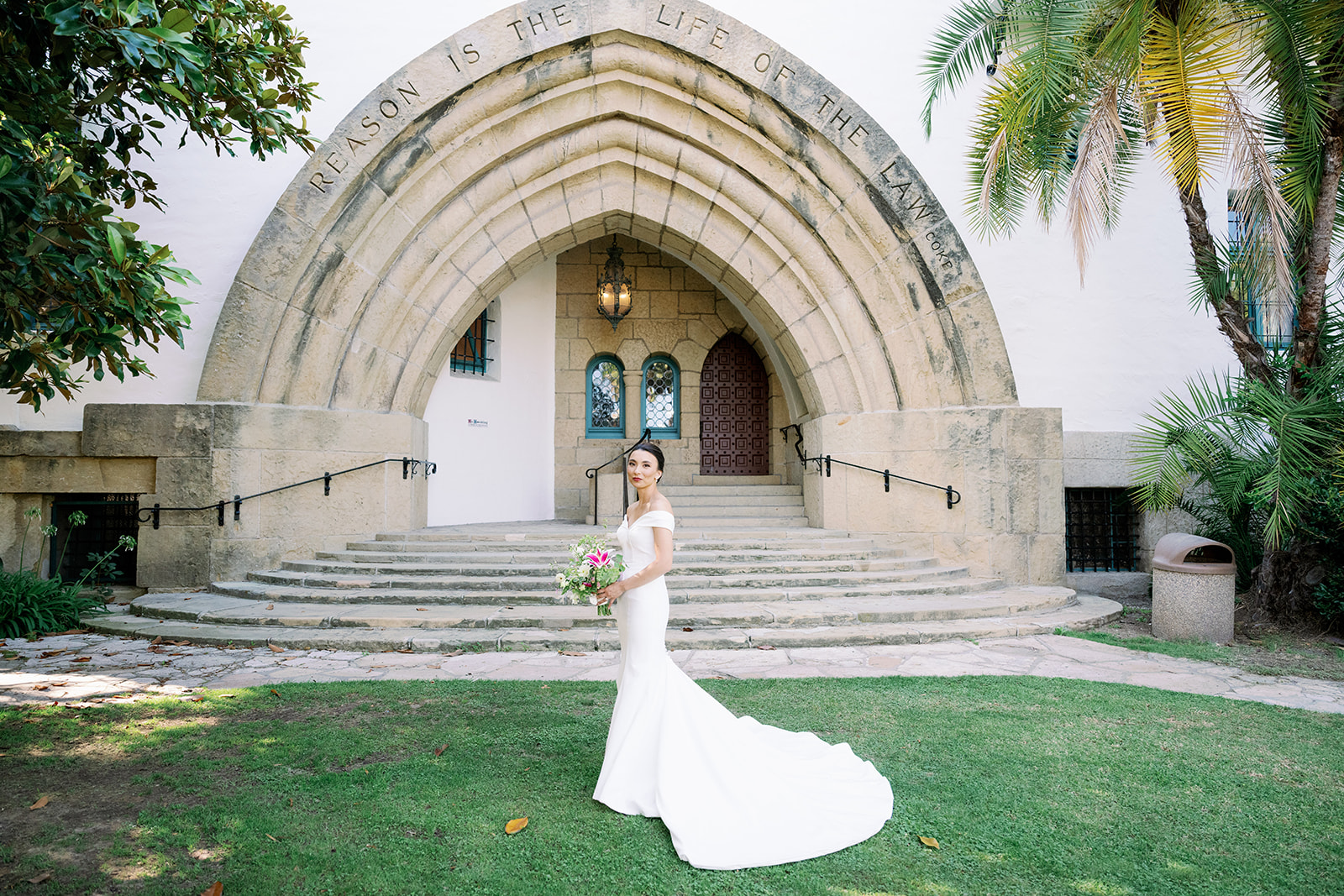 Bride posing in front of the Santa Barbara Courthouse.