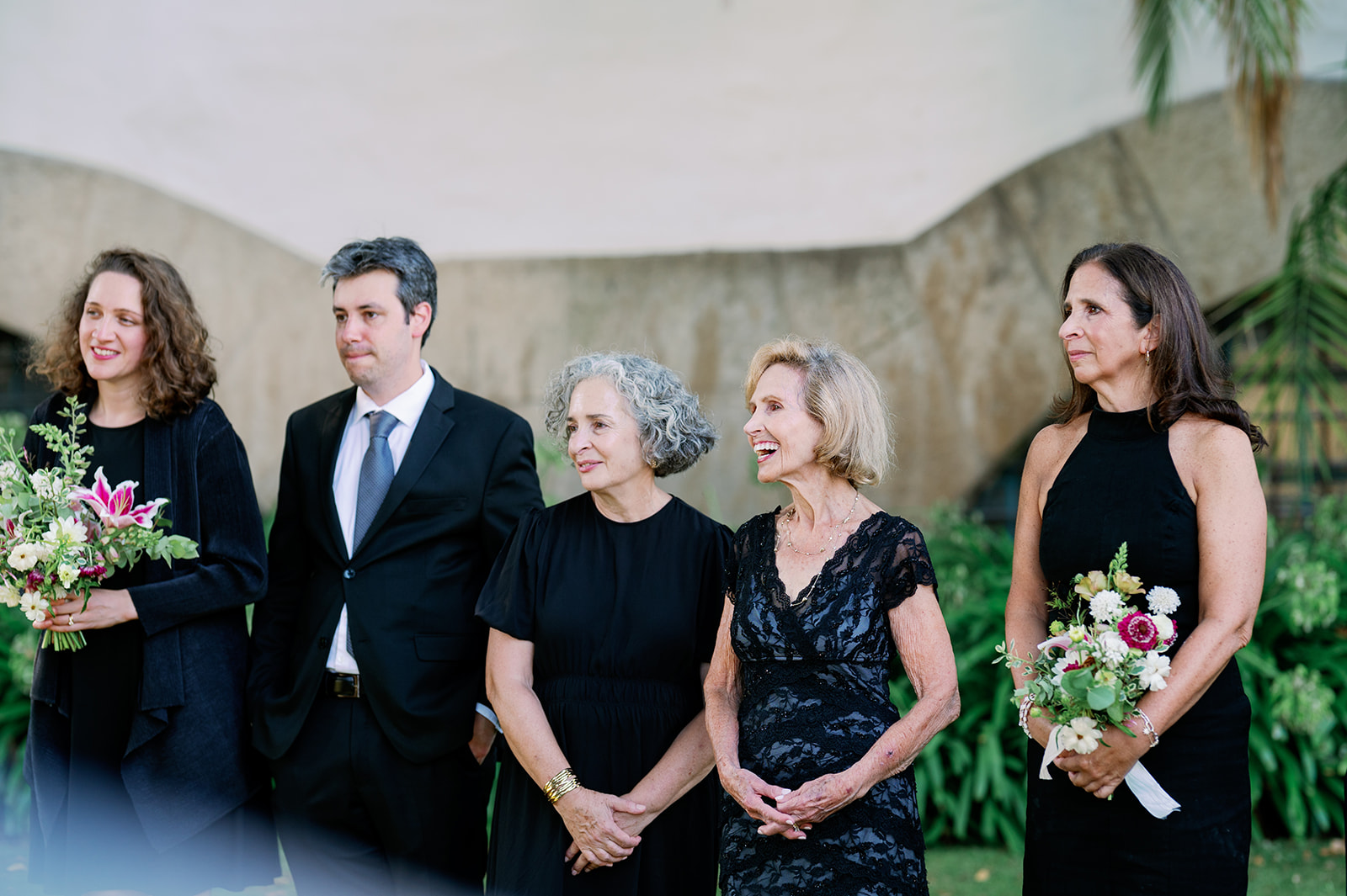 Guests sharing an emotional moment during a Santa Barbara Courthouse wedding ceremony. 