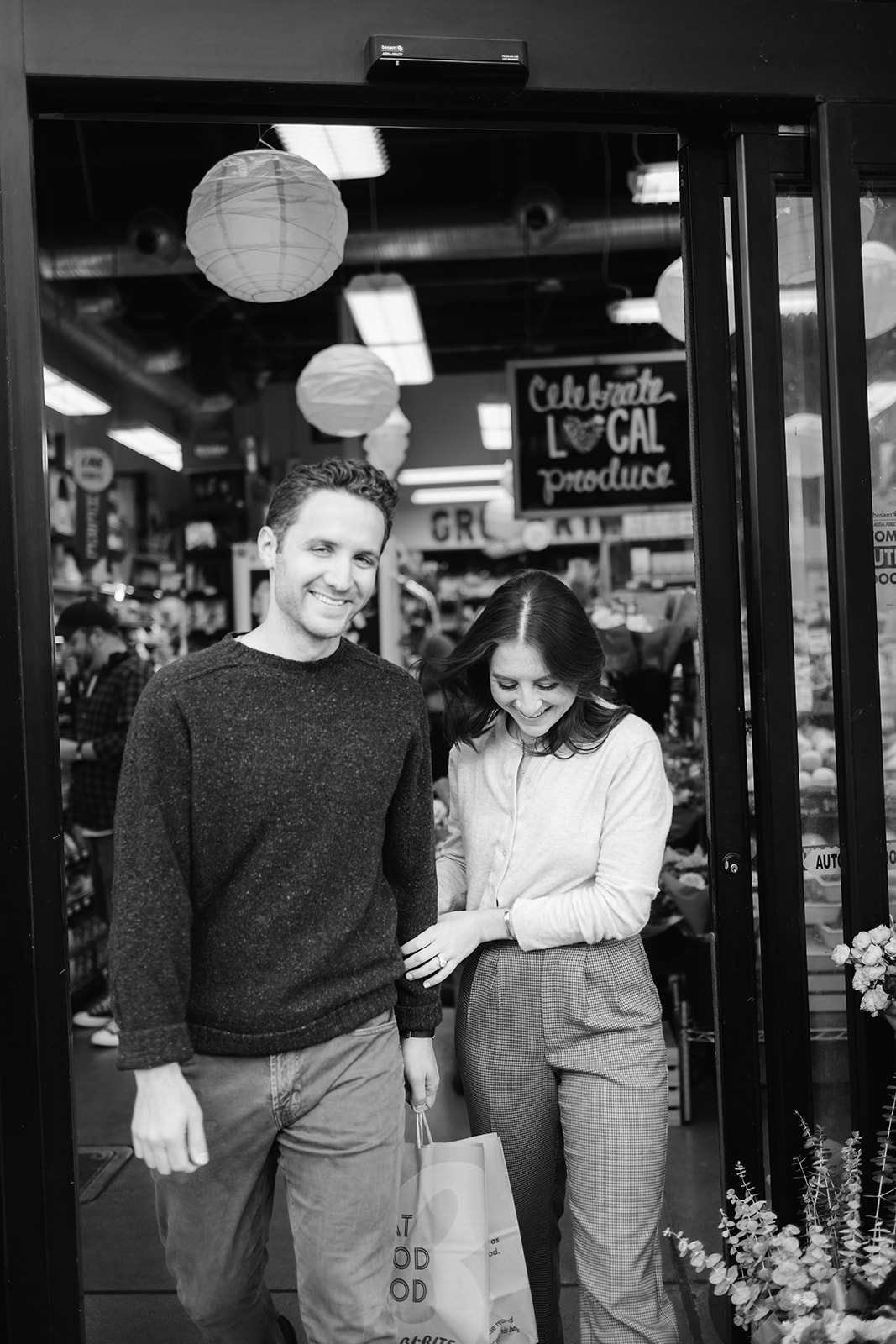 Black and white cinematic grocery store engagement session in San Francisco. 
