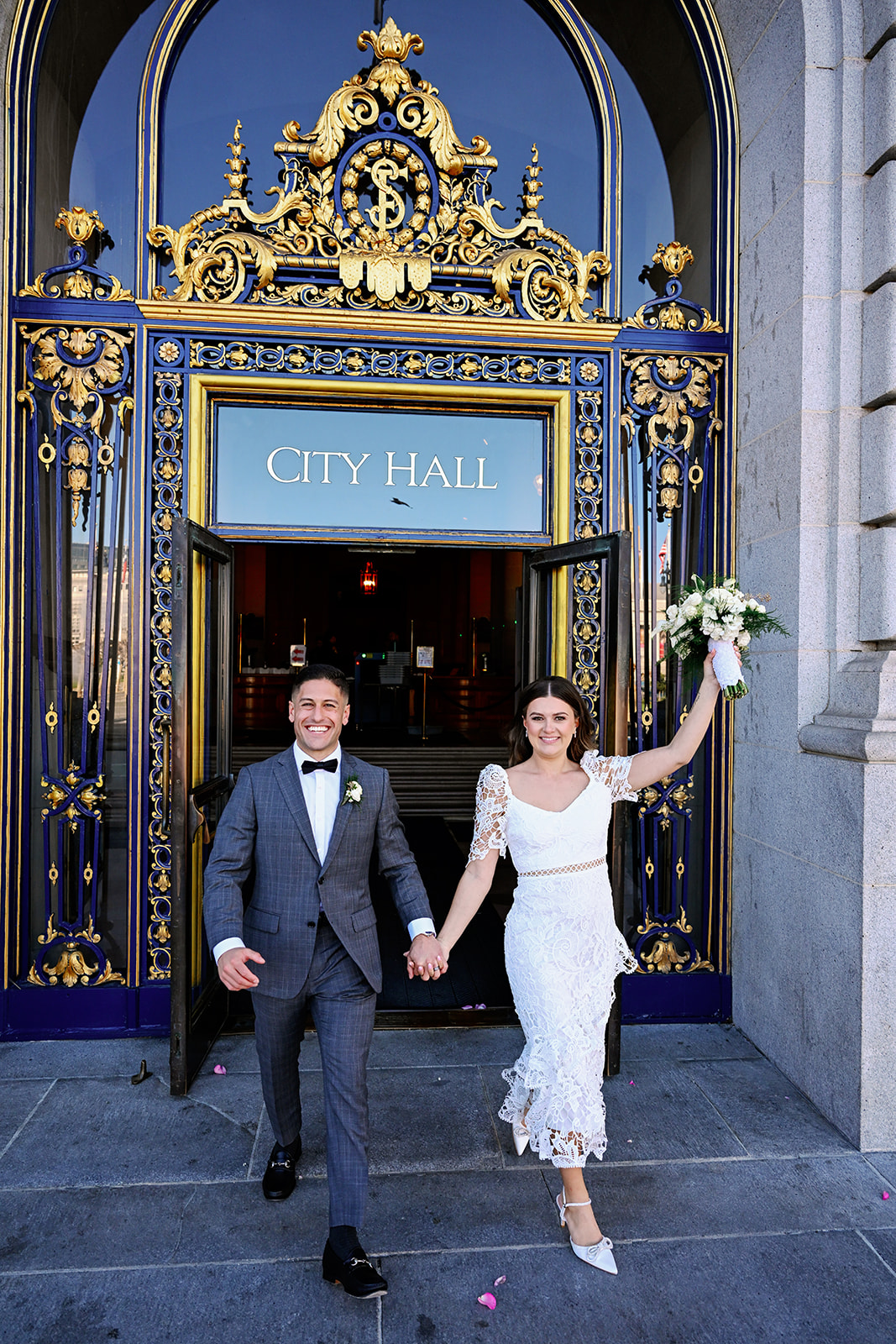San Francisco City Hall candid bride and groom photo. 