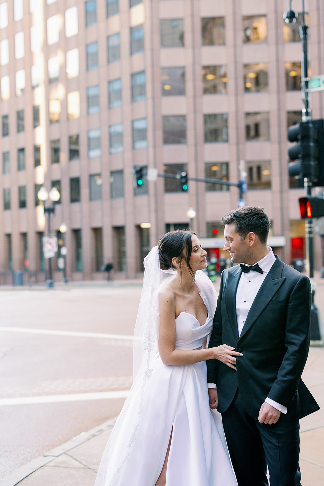 Bride and groom candid portrait in downtown Boston. 