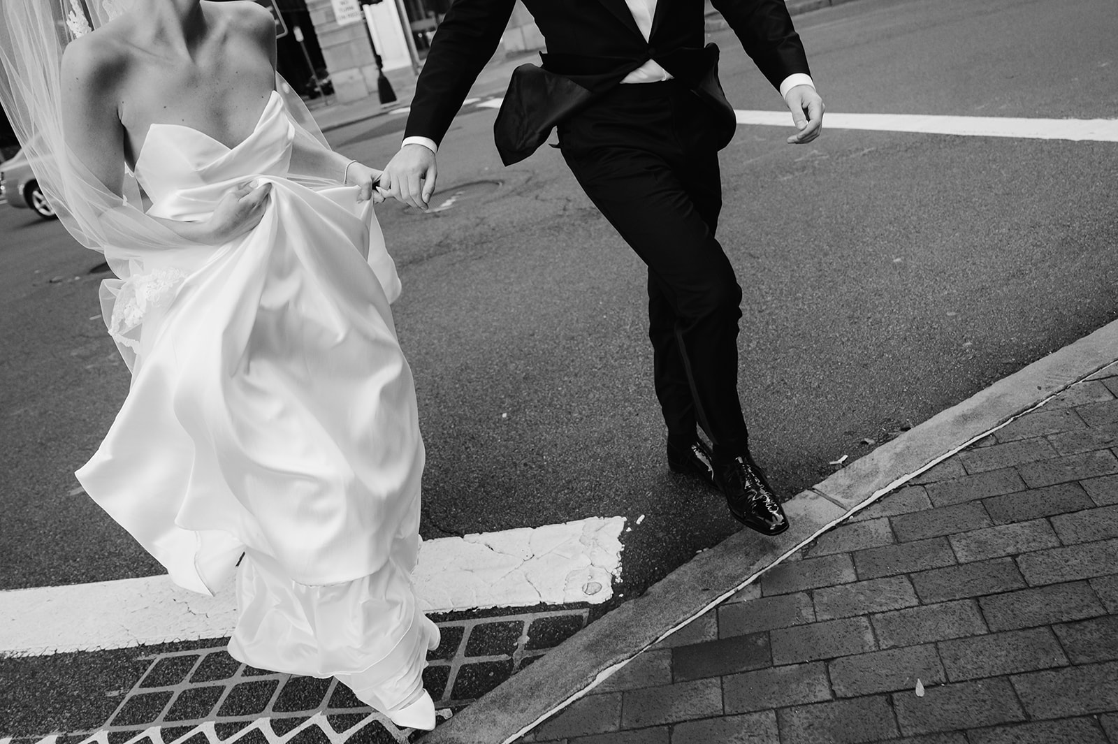 Candid bride and groom walking shot. 