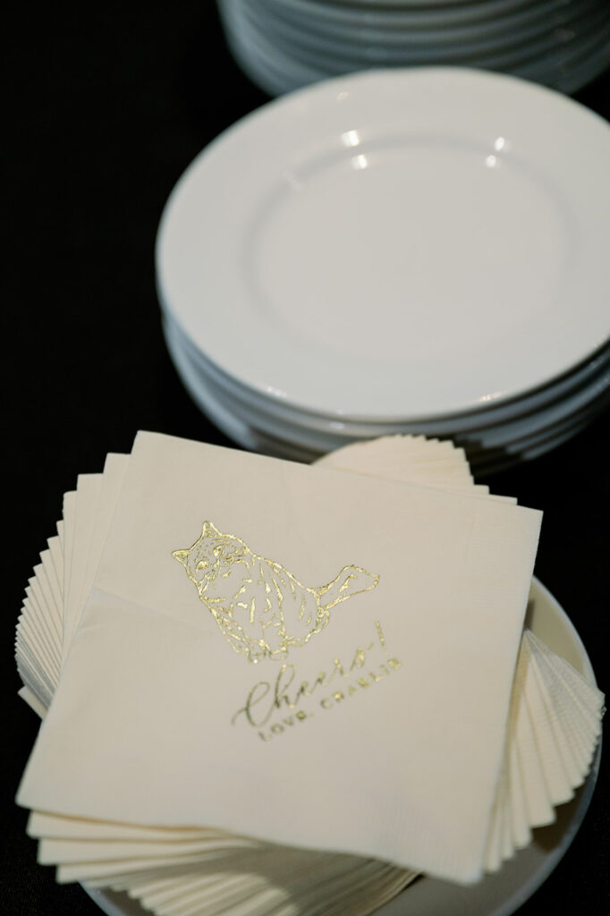 Custom wedding napkins with the couple's pet. 